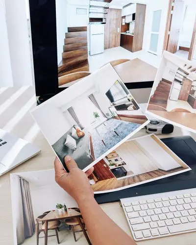 Interior designer checking photos